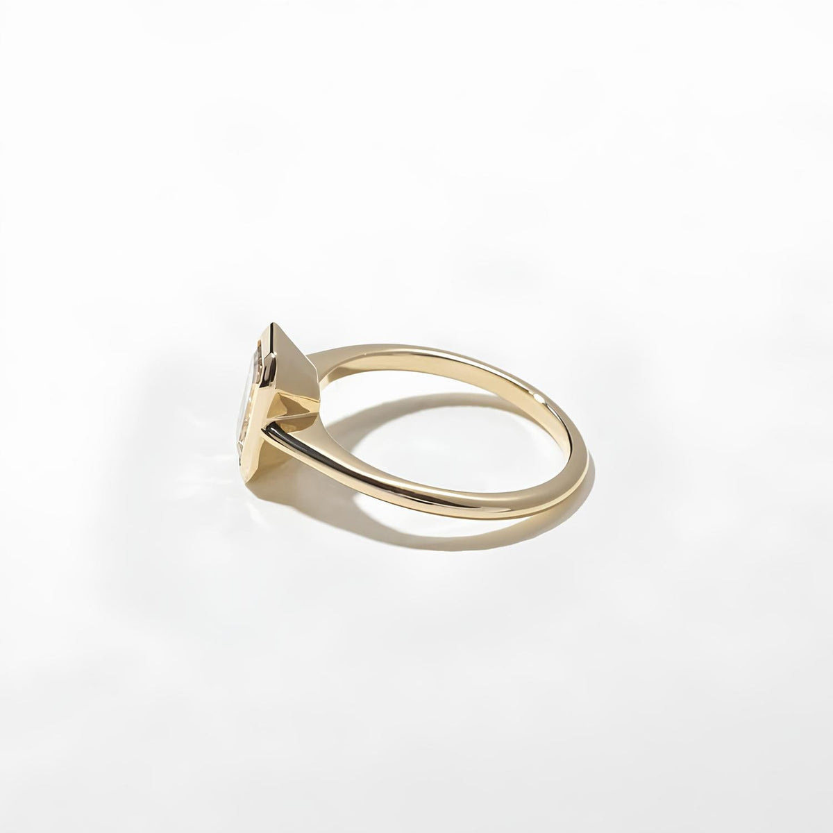 1.50 Carat Emerald Cut Lab Grown Diamond Bezel Solitaire Ring in Solid Gold - Mivaan Fine Jewelry