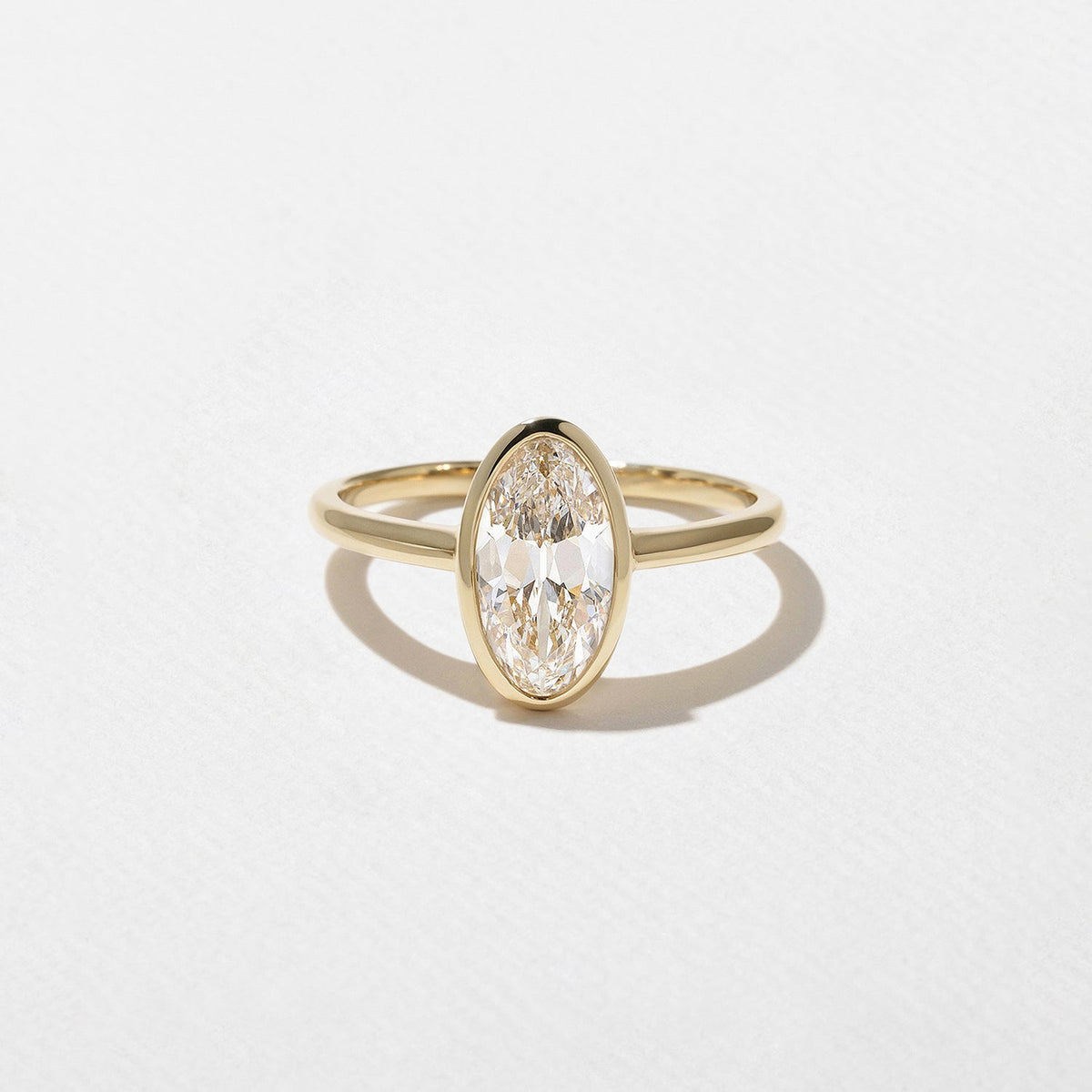 1.50 Carat Oval Cut Lab Grown Diamond Bezel Set Ring in Solid Gold - Mivaan Fine Jewelry