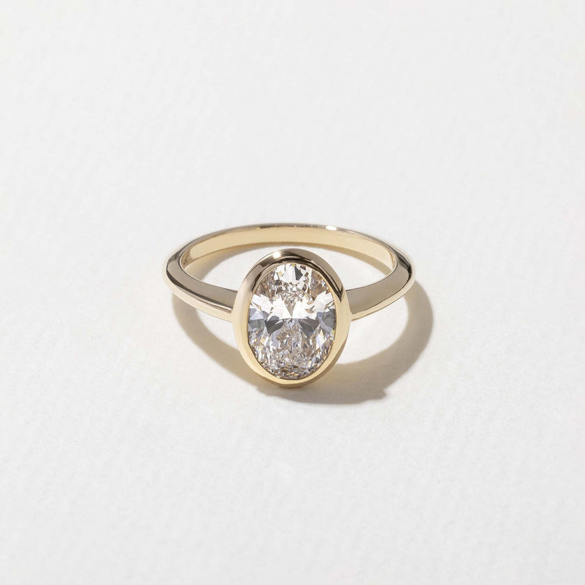 1.50 Carat Oval Cut Lab Grown Diamond Bezel Set Solitaire Ring in Solid Gold - Mivaan Fine Jewelry