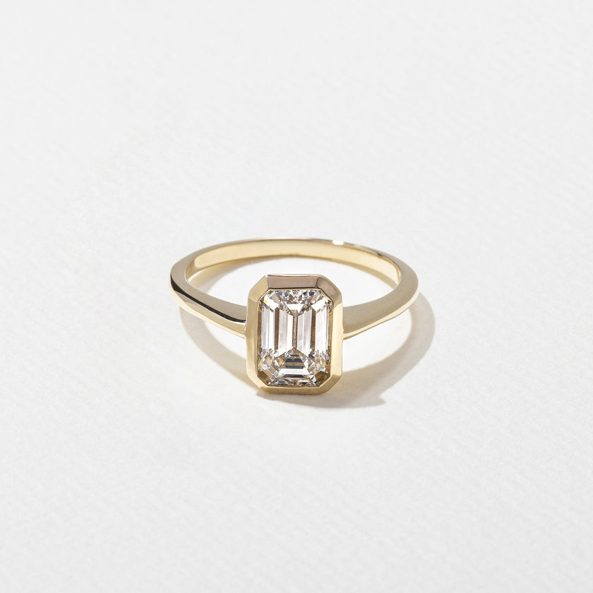 1.55 Carat Emerald Cut Lab Grown Diamond Bezel Solitaire Ring in Solid Gold